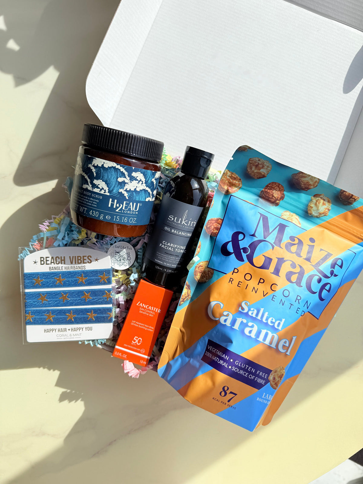 Full August box flat lay